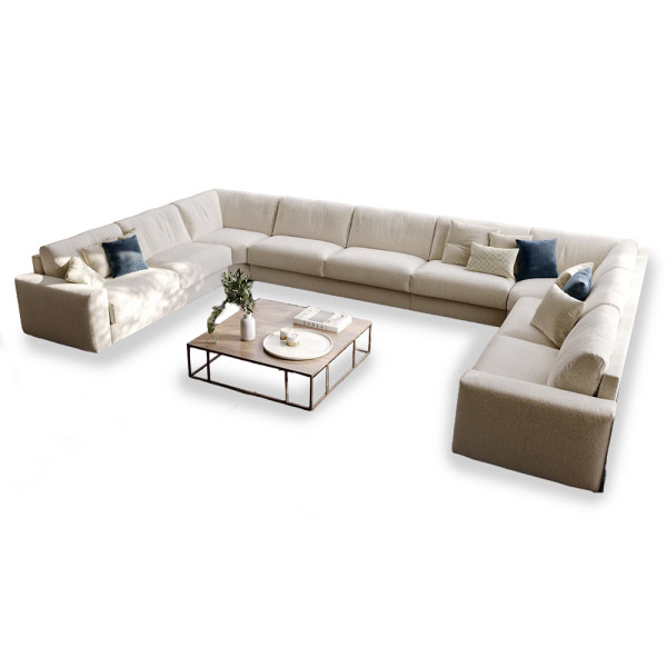 Canapé d'angle convertible Morbidone aux lignes intemporelles avec larges accoudoirs